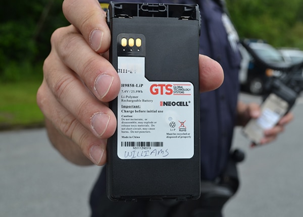 Officer holding Neocell battery